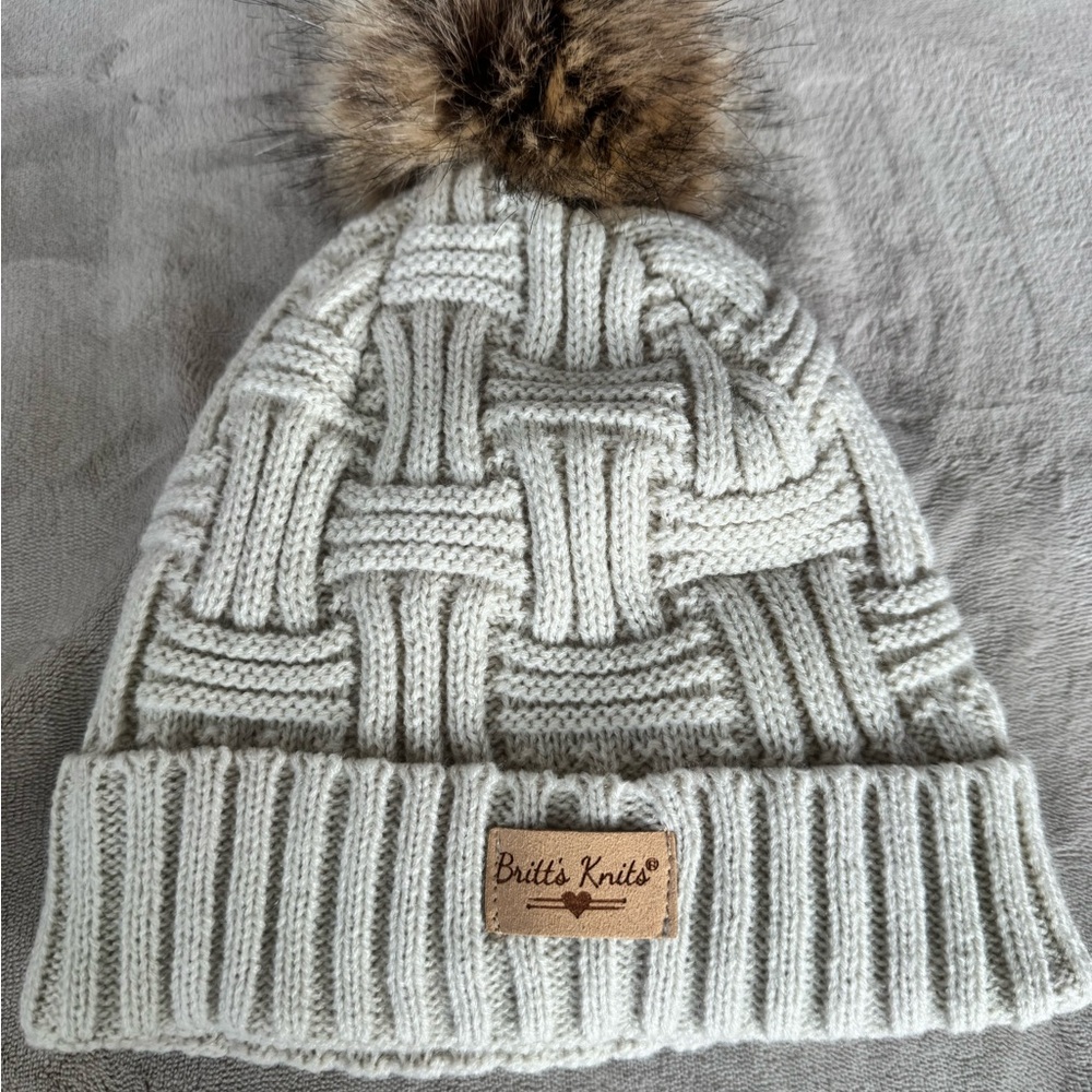 Britt’s Knits Cream Pom-Pom Beanie – Fleece Lined